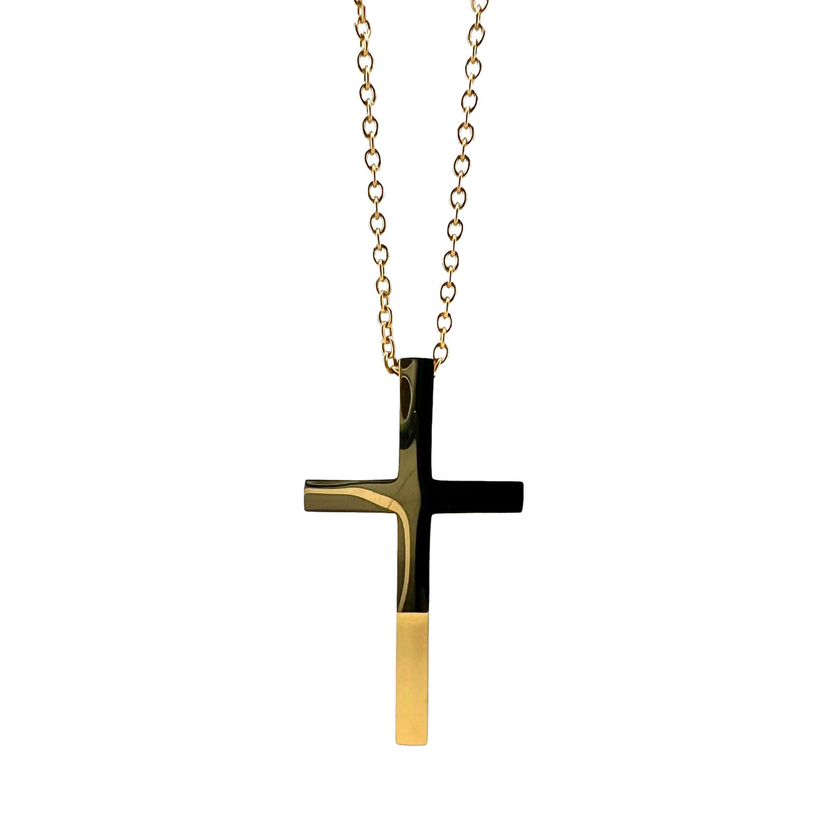Gold and black cross pendant on a delicate gold chain necklace.