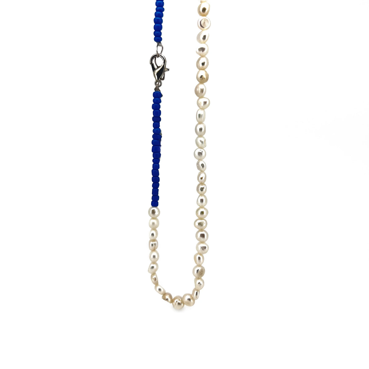 Pearl necklace with a section of blue beads and a metal clasp.