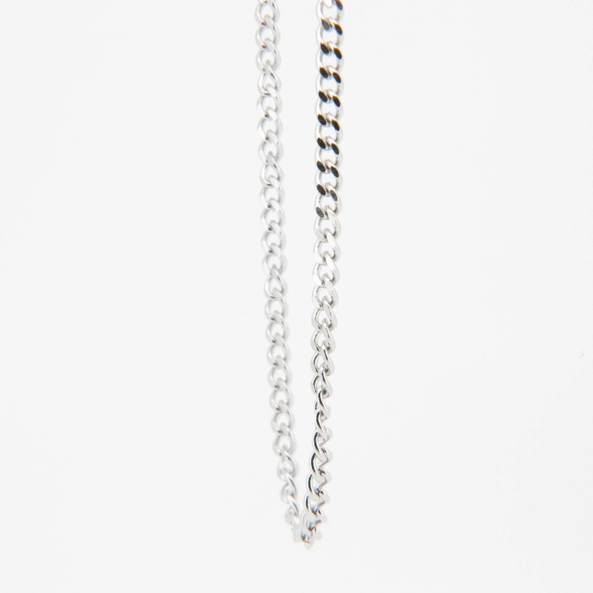 Silver chain necklace with interlocking links.