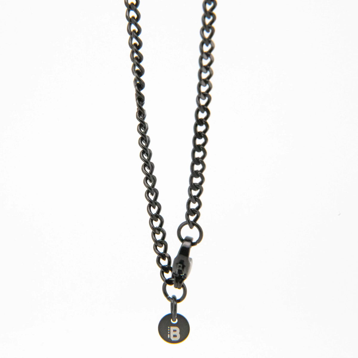 Dark metal chain necklace with a small pendant charm.