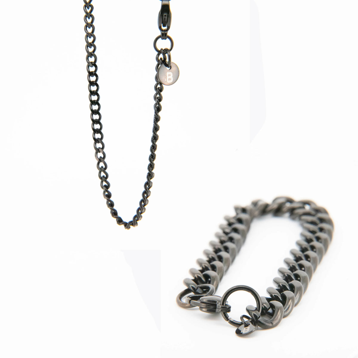 Gunmetal gray chain bracelet with a circular clasp.