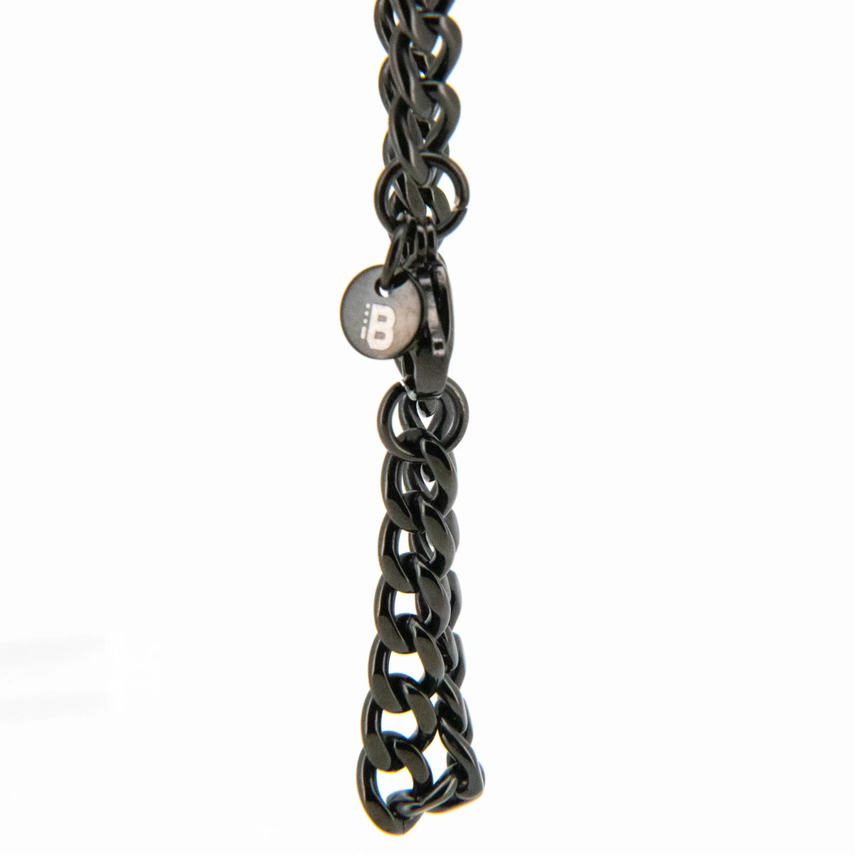 Dark metallic chain with a small pendant or charm.