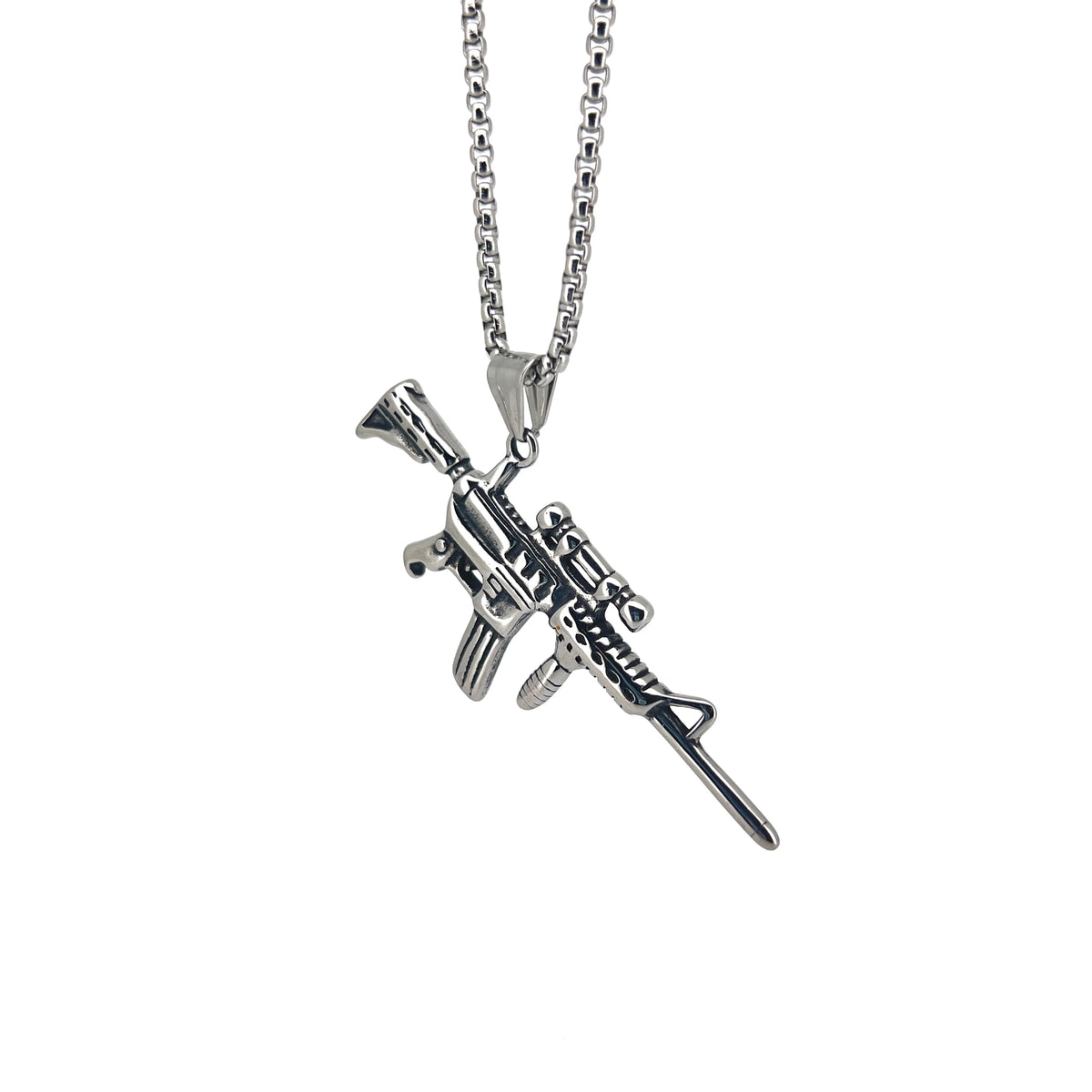 Silver pendant necklace shaped like an assault rifle.