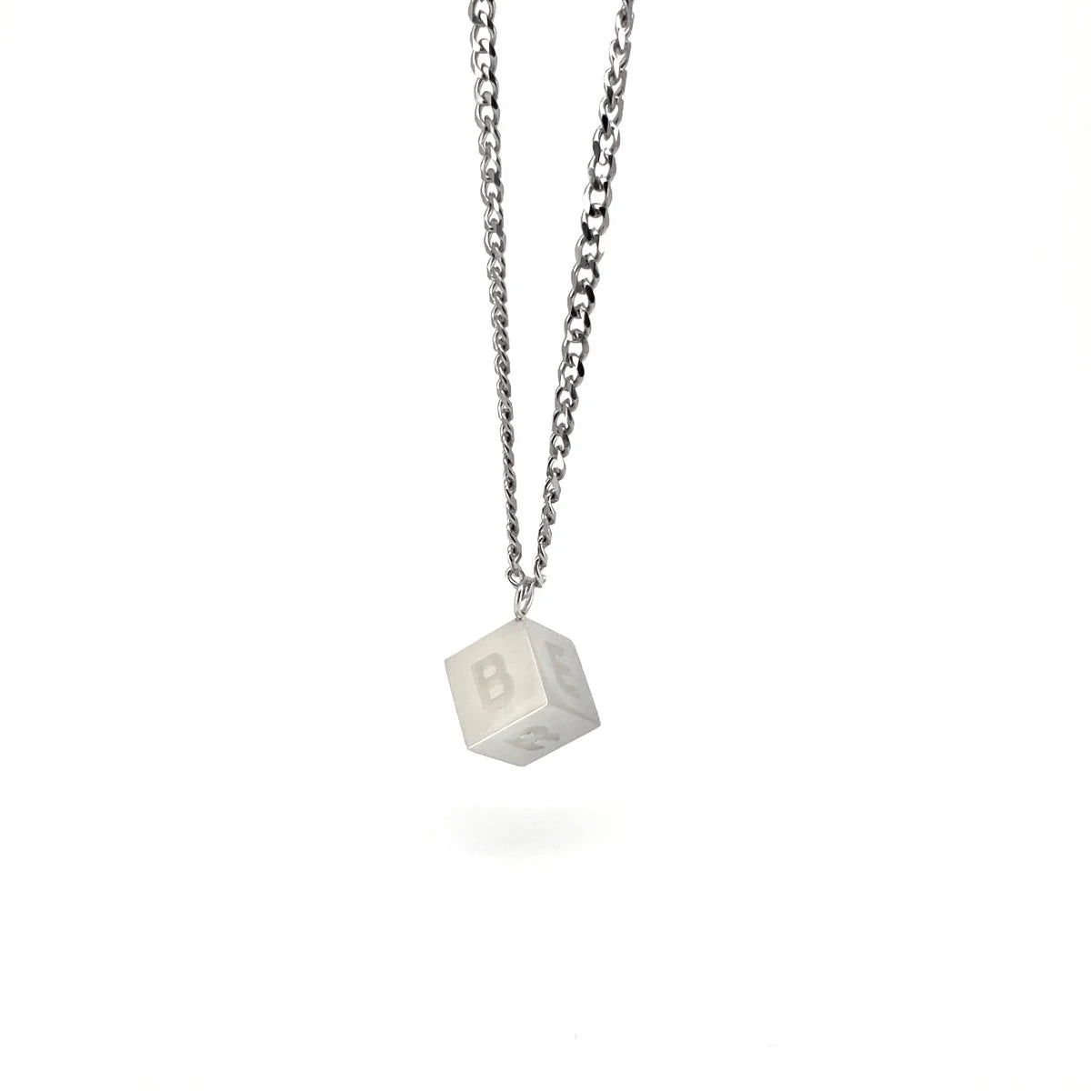 Cube-shaped pendant with the number 8 engraved on it, hanging from a silver chain necklace.