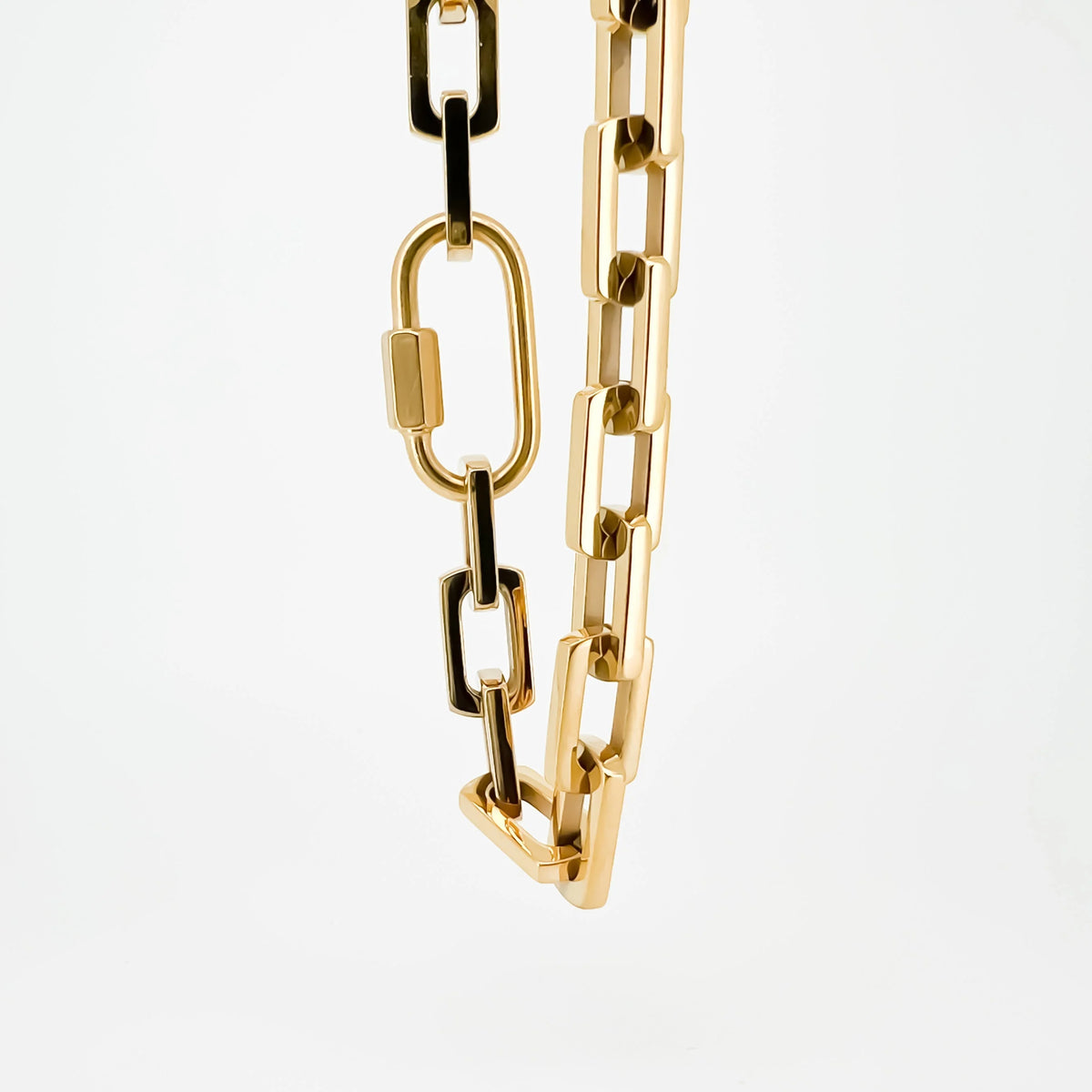 Gold-colored chain necklace with mixed link styles.