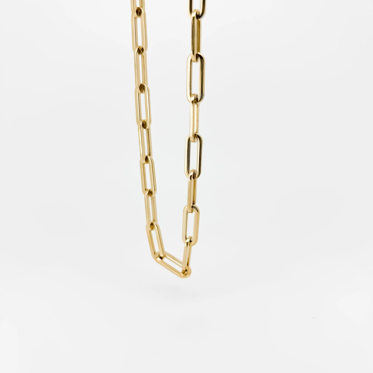 Gold chain necklace with elongated oval links.