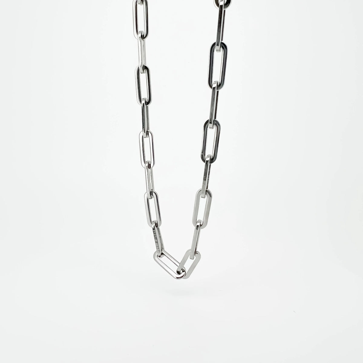 Silver chain with elongated oval links.