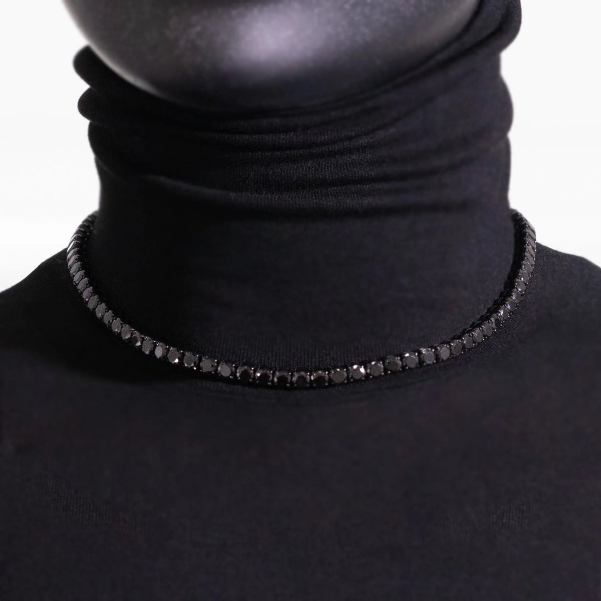 Black diamond tennis necklace.
