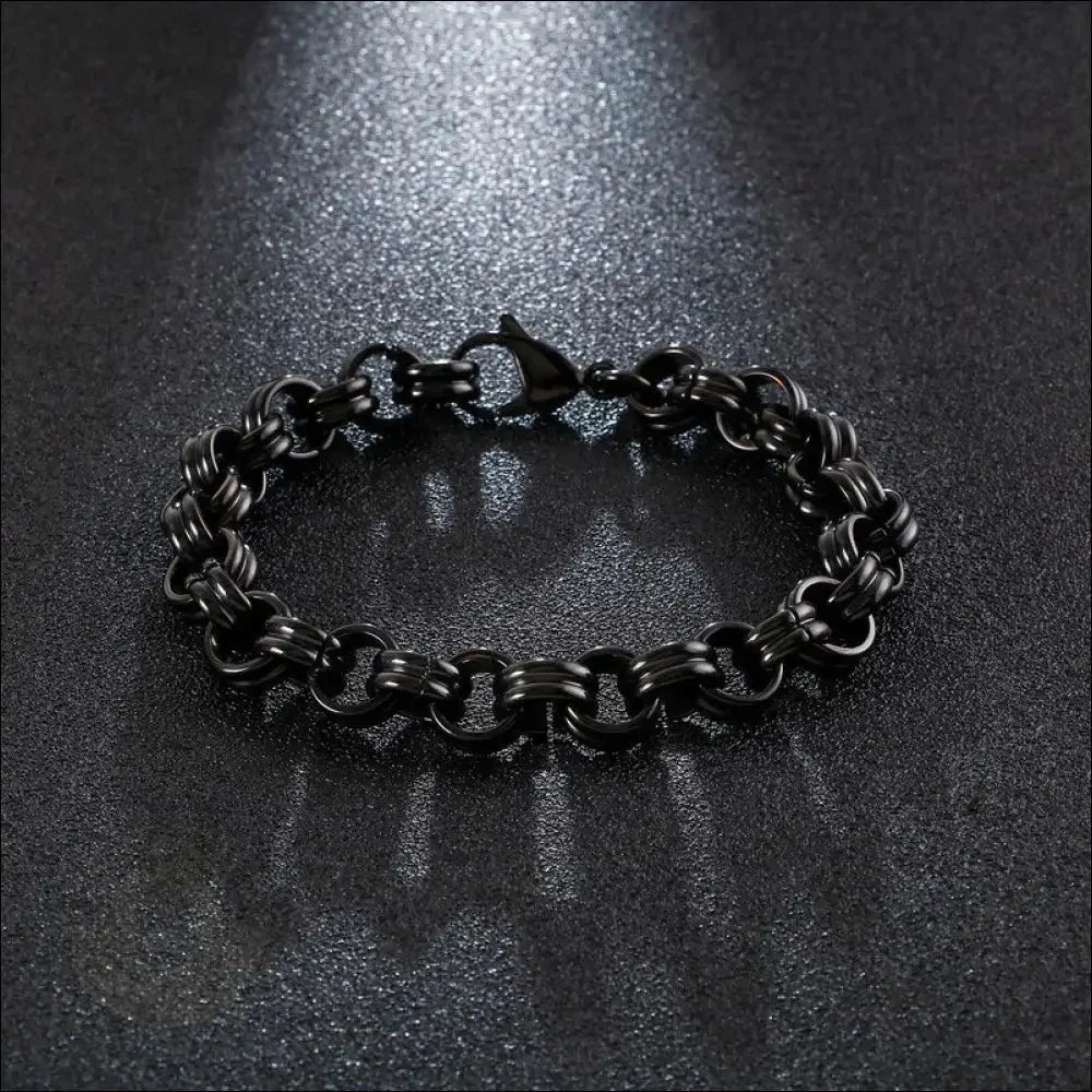 Black metal chain bracelet with interlocking links.