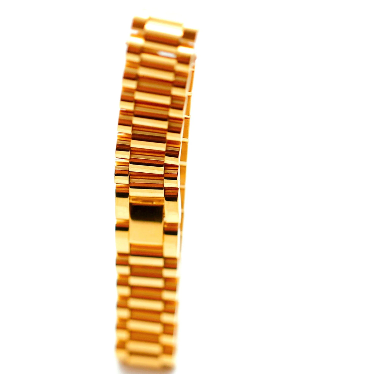 Gold watch bracelet or band with a linked design.