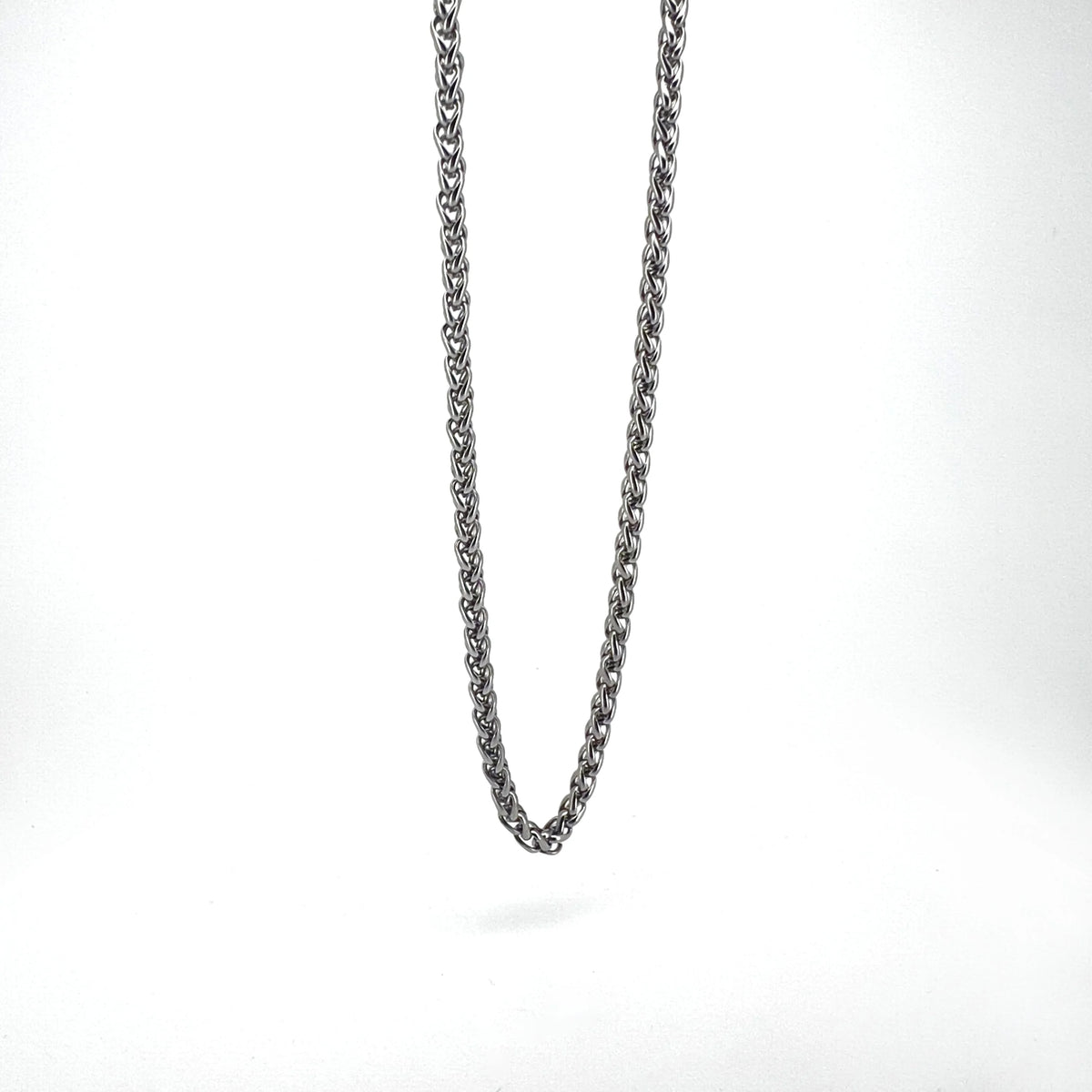 Silver braided chain necklace.