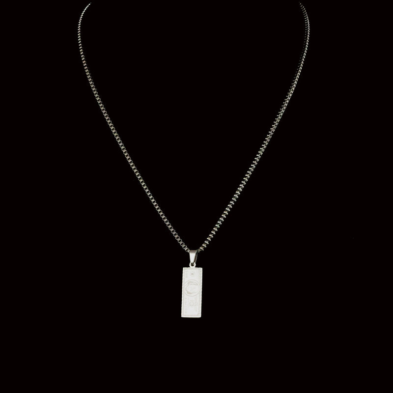 Silver necklace with a rectangular pendant.