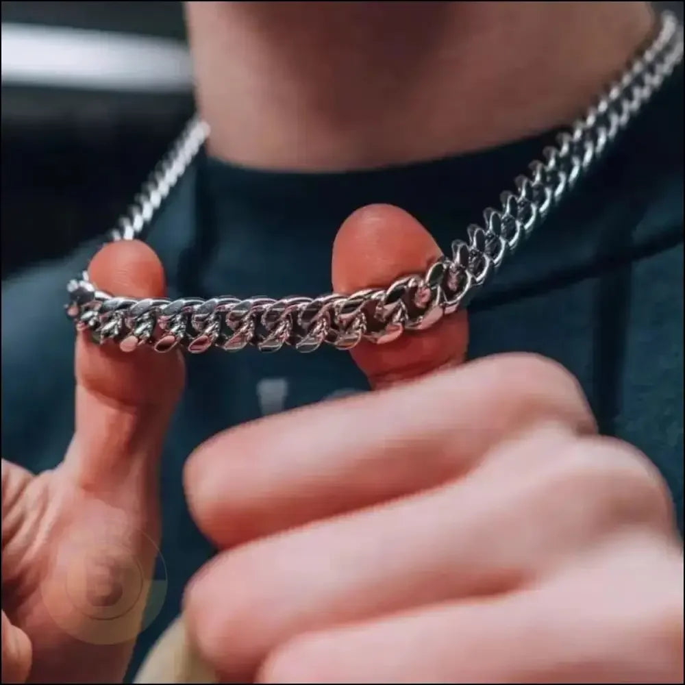 Silver chain bracelet with interlocking links.