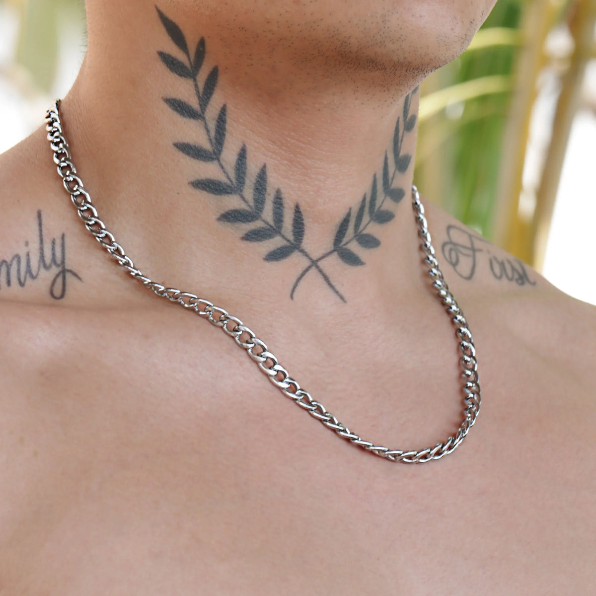 Silver chain necklace with a classic curb link design.