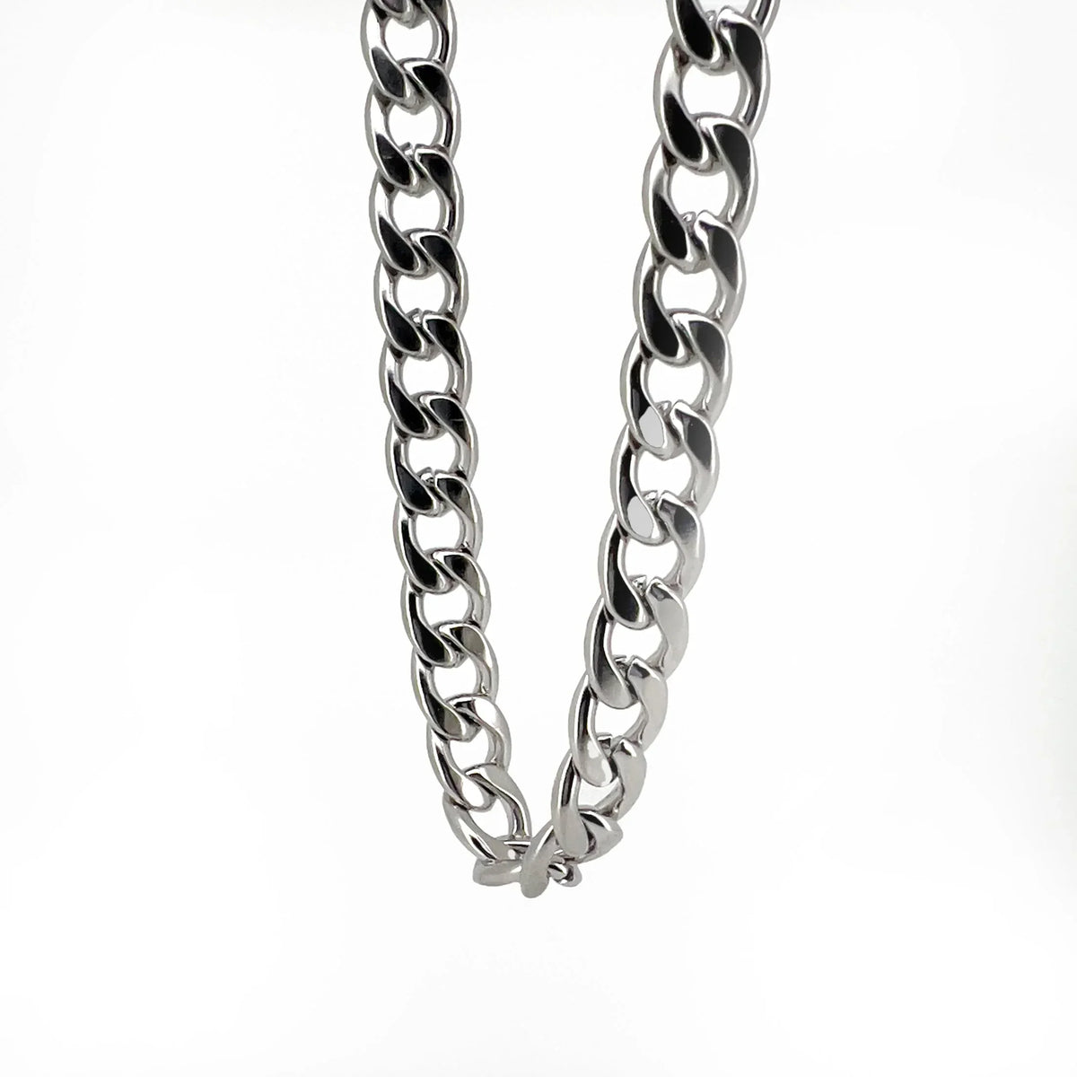 Silver metallic chain with interlocking links.