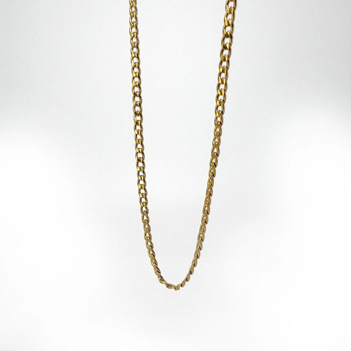 Gold chain necklace with a simple link design.