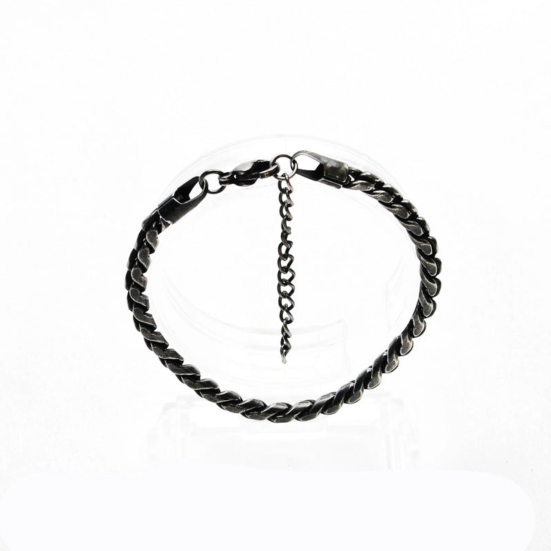 Twisted metal chain bracelet with a clasp and extender chain.