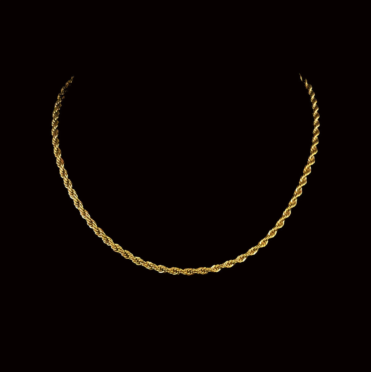 Gold rope chain necklace.