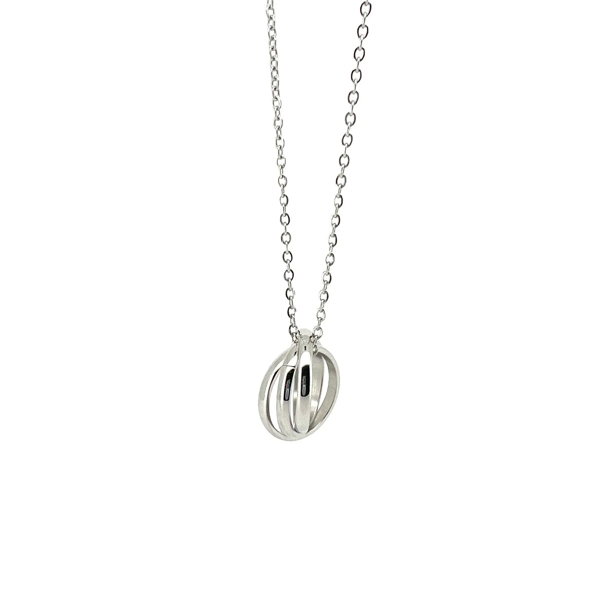 Silver pendant necklace with overlapping circular rings on a chain.