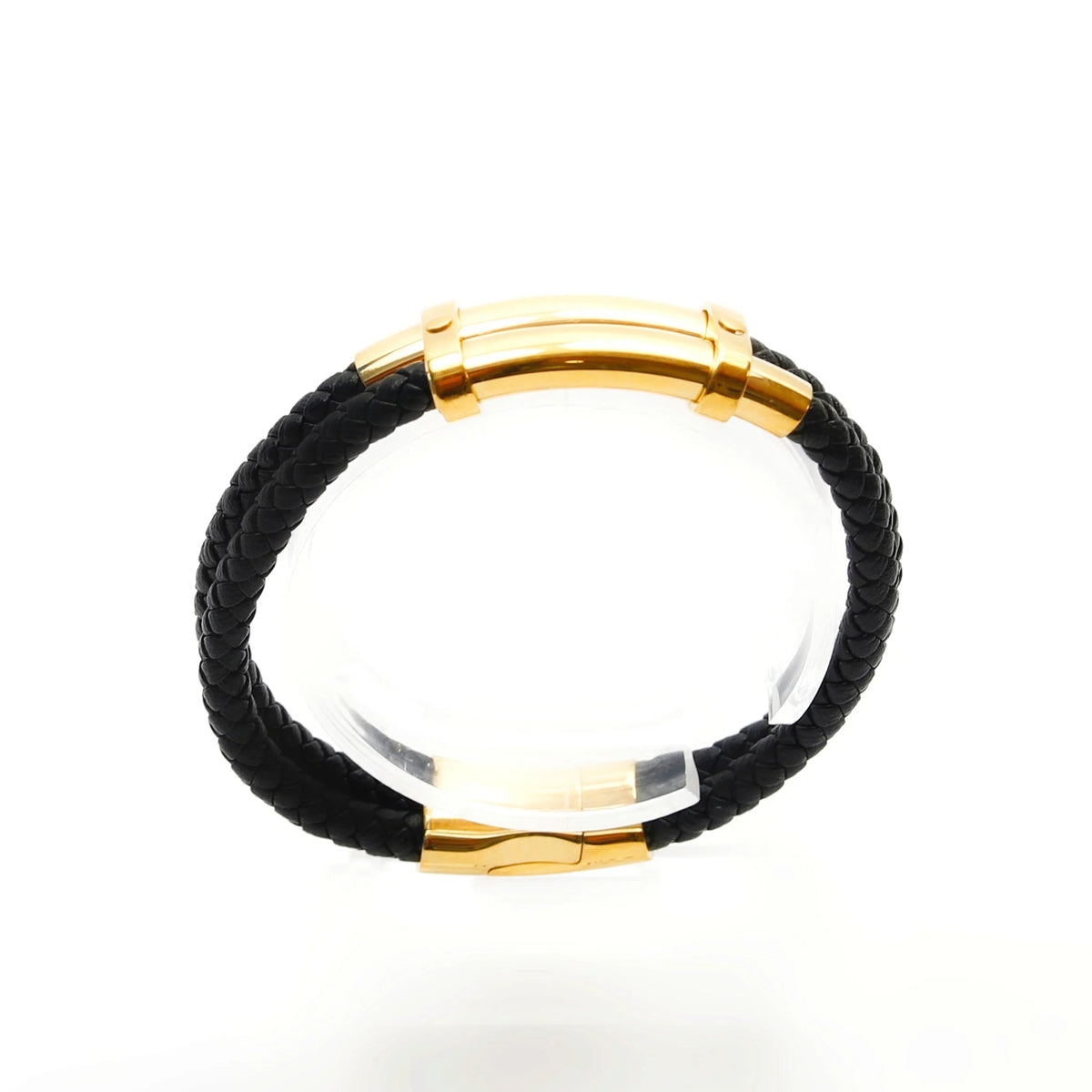 Black leather bracelet with gold-colored metal accents.