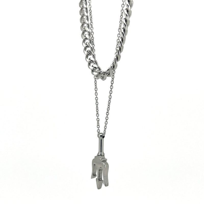 Silver necklace with a chunky chain and a hand-shaped pendant.