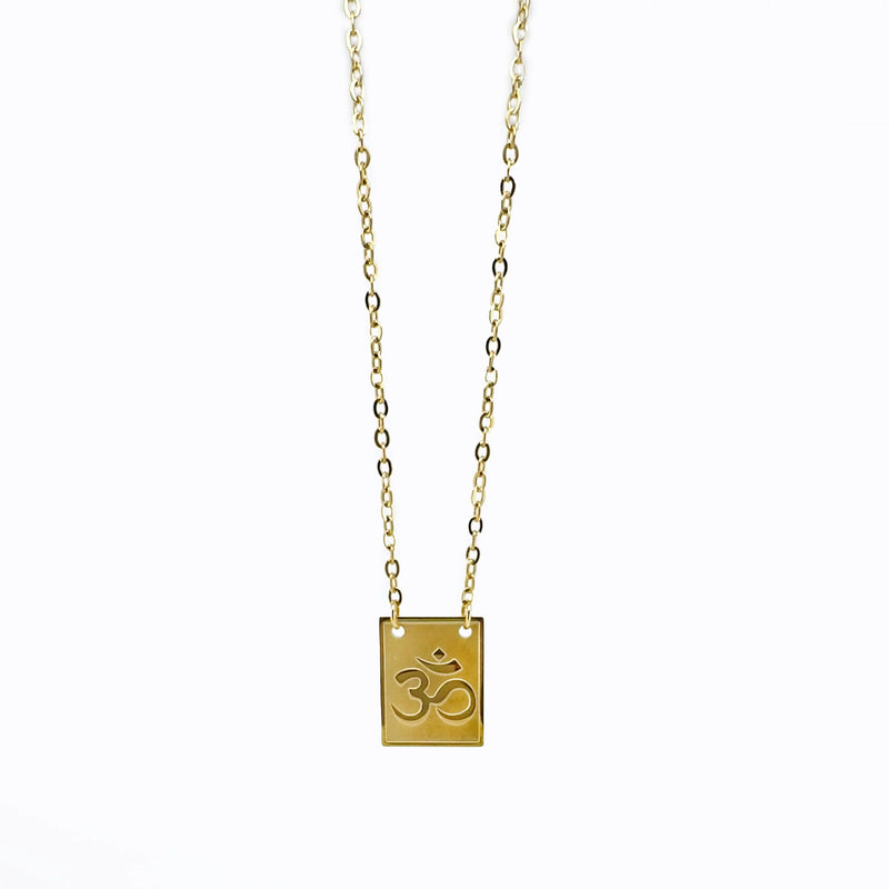 Gold-colored necklace with an Om symbol pendant.