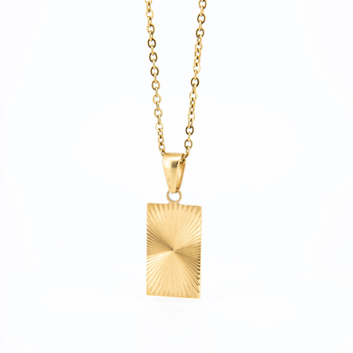 Gold rectangular pendant necklace with a sunburst pattern.