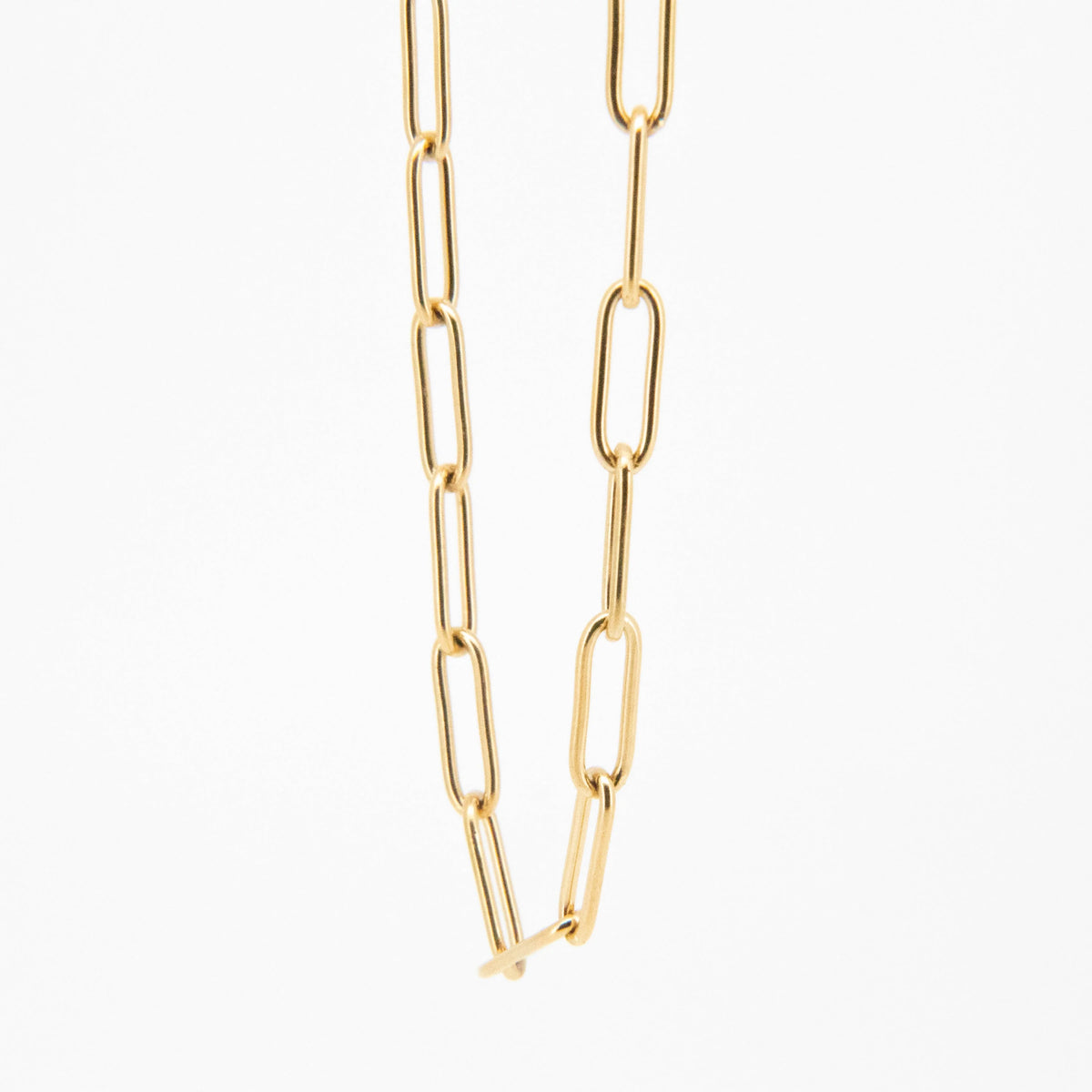 Gold-toned rectangular link chain.