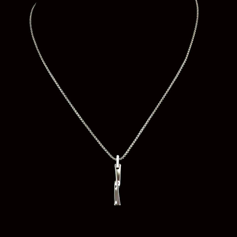 Silver necklace with a twisted bar pendant.