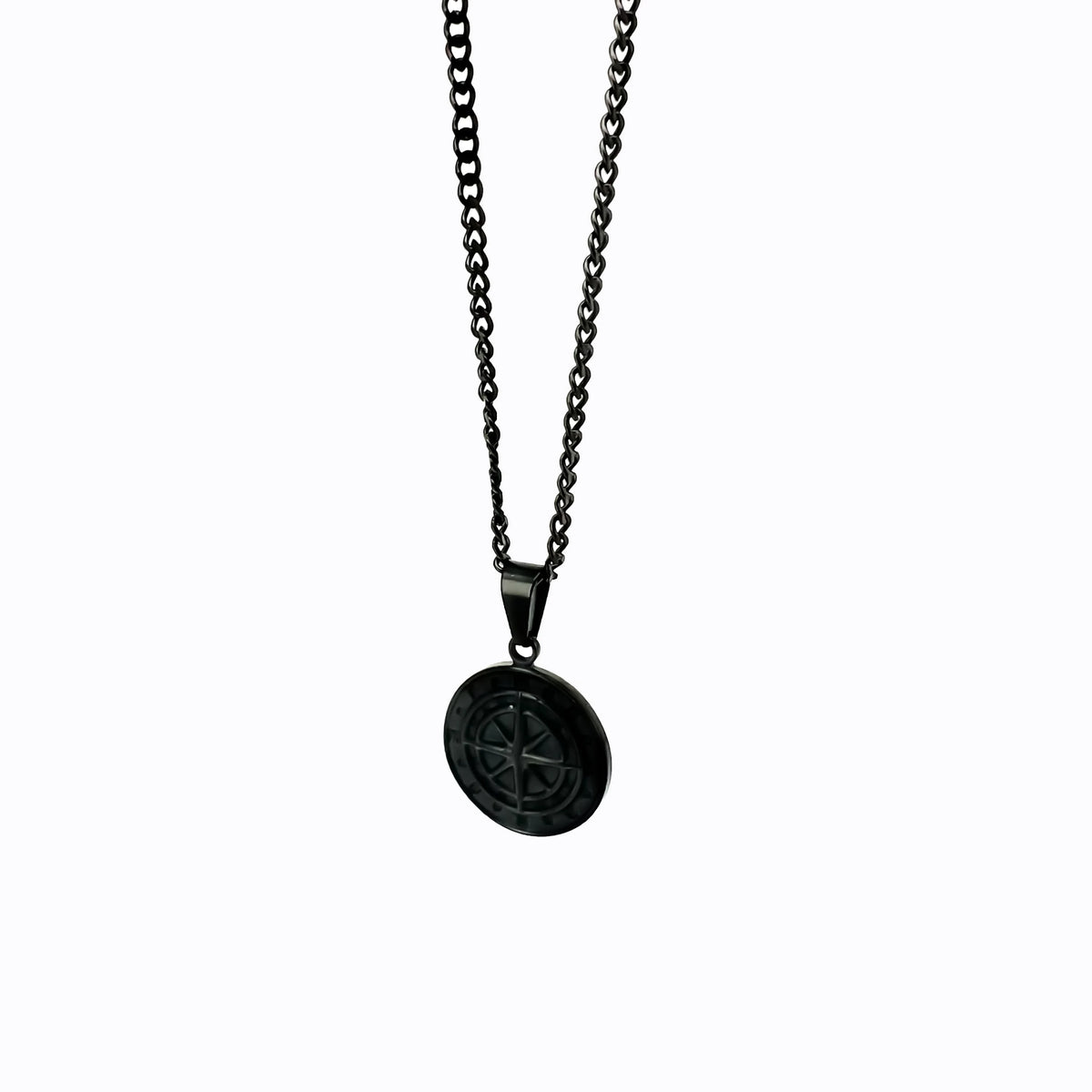 Black metal pendant necklace with a circular medallion charm.