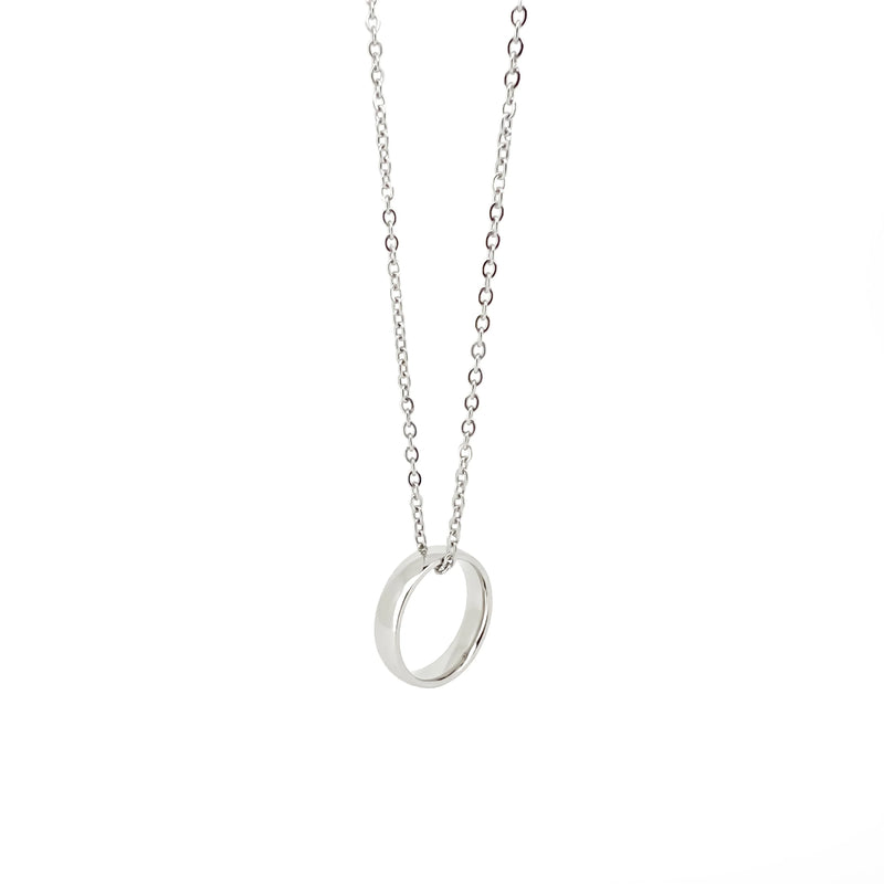 Silver ring pendant necklace with a delicate chain.