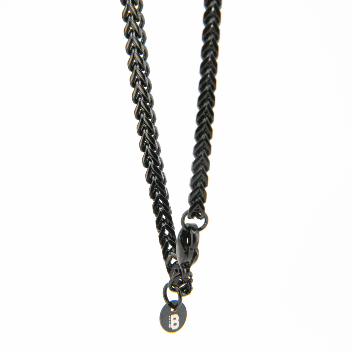 Dark metallic chain necklace with a braided pattern.