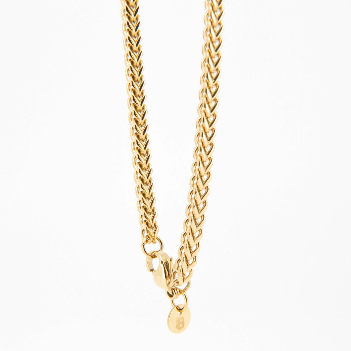 Gold-toned braided chain necklace with a clasp.