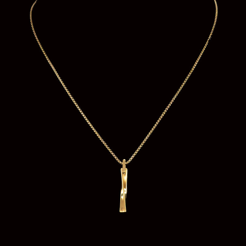 Gold necklace with a twisted bar pendant.