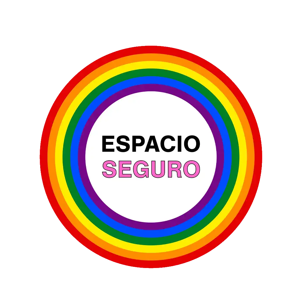 A rainbow-bordered circular badge with the Spanish text ’ESPACIO SEGURO’ (’Safe Space’) in the center.