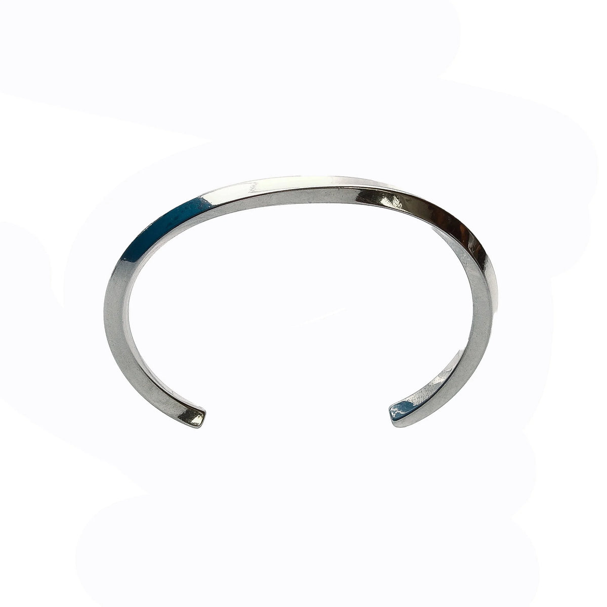 Silver metallic cuff bracelet with a sleek, minimalist design.