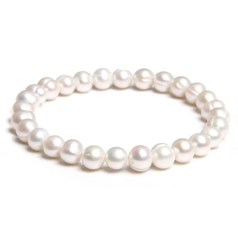 Pearl bracelet with round, lustrous beads strung together.