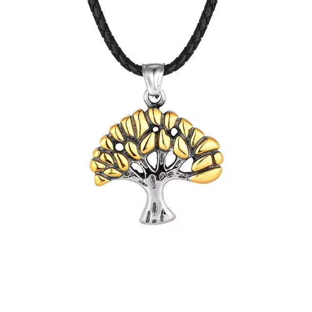 Tree-shaped pendant with silver trunk and golden leaves on a black cord necklace.