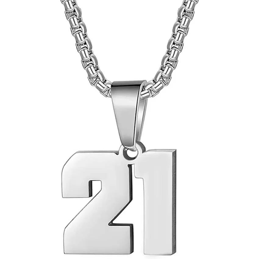 Silver pendant necklace featuring the number ’21’ as the charm.